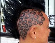Cheeta skull tattoo
